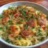 Delicious bowl of Vermicelli Upma garnished with vegetables and spices