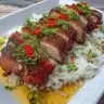 Delicious Char Siu Chicken served on a plate with vibrant vegetables
