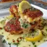 Lemon Pecorino Crusted Chicken served with creamy lemon sauce