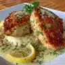 Lemon Pecorino Crusted Chicken served with creamy lemon sauce