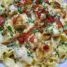 Creamy Chicken Fettuccine Alfredo served on a plate with parsley garnish