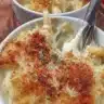 Creamy baked macaroni and cheese, a delicious comfort food dish.