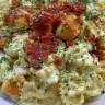 Creamy Marry Me Chicken Bowtie Pasta garnished with herbs in a bowl