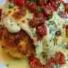 Delicious melt-in-your-mouth chicken served with herbs and spices.