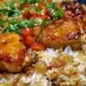 One-Pan Honey BBQ Chicken Rice served on a rustic wooden table