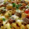 Delicious Philly Cheese Steak Pasta served in a bowl with melted cheese and peppers.