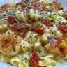 Delicious sticky smoky garlic butter chicken pasta served in a bowl