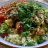 Delicious teriyaki chicken rice bowl with vegetables and savory sauce