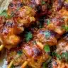 Delicious Bang Bang Chicken skewers ready to serve, quick 30-minute recipe.