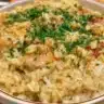 Delicious Chicken Rice Casserole topped with crispy herbs and golden cheese