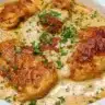 Creamy Cajun chicken cooked in a skillet for a quick weeknight dinner