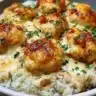 Creamy smothered chicken served on rice with rich gravy