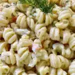 Bowl of Dill Pickle Pasta Salad ready in 30 minutes, perfect for a quick meal.