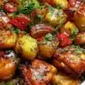 Hawaiian chicken sheet pan dinner with colorful vegetables.