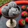 Creamy black sesame ice cream with roasted black sesame paste, rich in flavor and color.