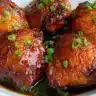 Delicious soy sauce chicken served with steamed rice and vegetables.