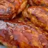 Delicious BBQ Baked Chicken Breasts served with a side salad
