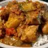 Delicious Jamaican Curry Chicken served in a vibrant dish