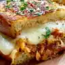 BBQ Chicken Grilled Cheese sandwich with melted cheese and grilled chicken.