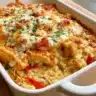 Delicious Chicken Fajita Casserole topped with cheese and peppers