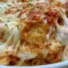 Chicken Parm Casserole topped with melted cheese and marinara sauce