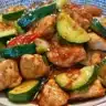 Chicken zucchini stir fry in a colorful dish, perfect for a quick weeknight meal.