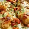 Creamy Low-Carb Tuscan Chicken served with fresh herbs and vegetables
