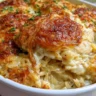 Delicious French Onion Chicken Orzo Casserole topped with melted cheese.