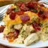 Low-carb chicken bacon ranch casserole topped with crispy bacon and cheese