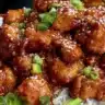 Air fryer sesame chicken with sesame seeds garnish