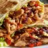 Teriyaki chicken wrap with fresh vegetables and sauce ready in 30 minutes.
