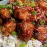 20 Minute Asian Air Fryer Sesame Chicken ready to serve with sesame seeds