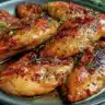 Air Fryer Honey Garlic Chicken Breast served on a plate with garnish