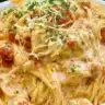 Delicious Chicken Spaghetti with Rotel in a bowl garnished with parsley