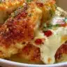 Deliciously crispy Parmesan Crusted Chicken served with sides