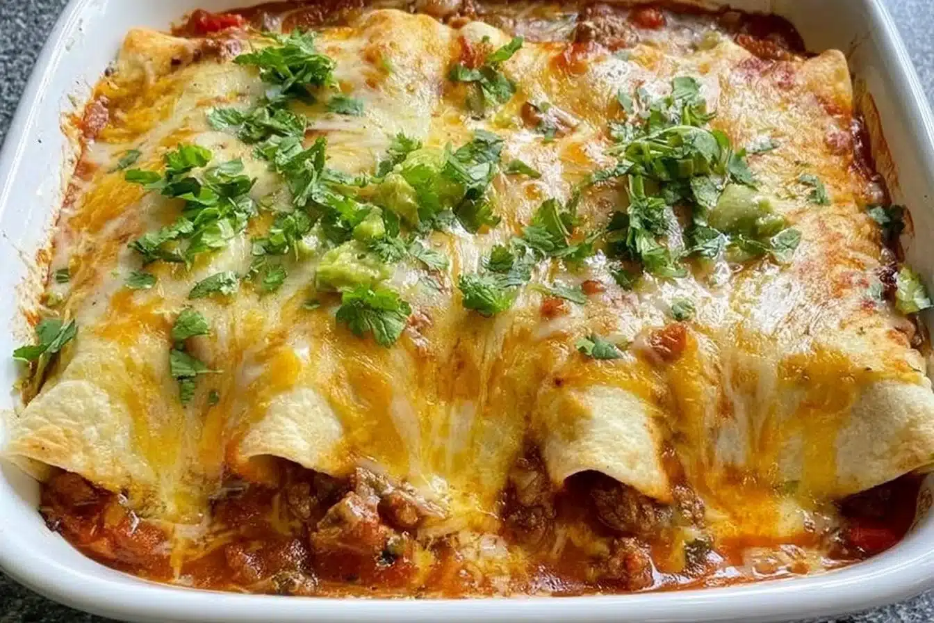 Delicious easy ground beef enchiladas served on a plate.