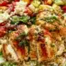 Lemon Herb Greek Chicken Bowls served with fresh vegetables and rice