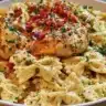 Mozzarella Garlic Butter Chicken served with cheesy cream bowtie pasta