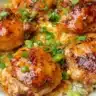 Delicious Skillet Bang Bang Chicken Thighs served in a skillet with vibrant vegetables