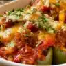 Delicious stuffed pepper casserole with colorful peppers and savory filling
