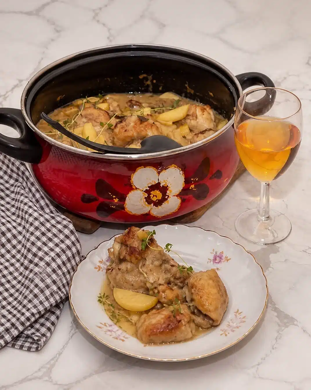 Delicious Chicken Normandy casserole in a pot, featuring creamy sauce and vegetables.