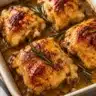 Delicious Maple Dijon Chicken drizzled with sweet and spicy sauce on a plate.
