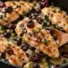 Crispy air fryer chicken tenders served with a sweet cranberry dip.