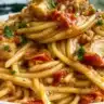Delicious chicken spaghetti served in a bowl, perfect for weeknight dinners.